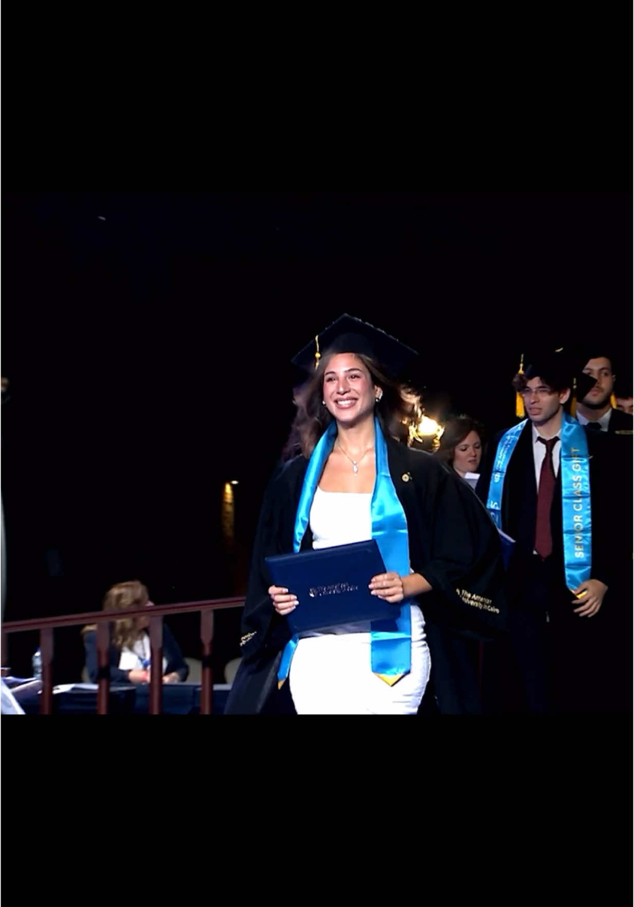 A post by @yourfavlillyxox on TikTok caption: Be right back crying 😭❤️ (Happy tears)  #graduation 