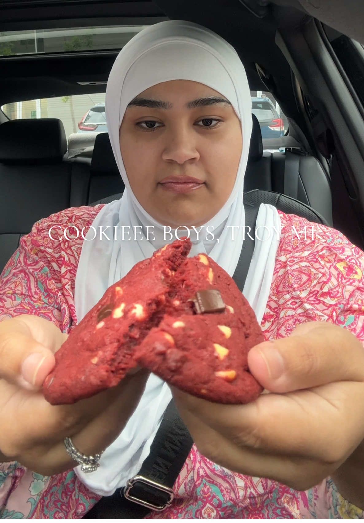 A post by @sharmineats on TikTok caption: Trying cookies from @Cookieeeboys in Troy Michigan, ummm these cookies are better than crumbl or insomnia 🤭🍪 #fyp #cookieeeboys #cookiereview #desserts #tastetest #review #sharmineats #redvelvetcookie #smores 