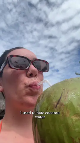 A post by @viviinthecity on TikTok caption: coconut water is the cure to life