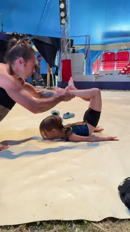 A post by @wow_family_circus on TikTok caption: @wow_dad_circus_family #circusartist #familycircus #stretching 