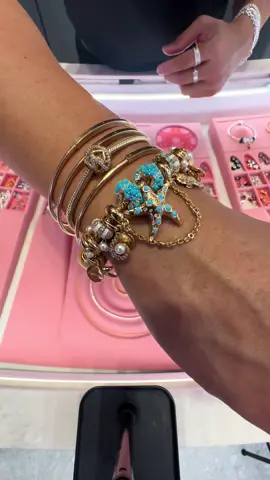 A post by @pandoralasvegas on TikTok caption: Replying to @𝓢𝓪𝓷𝔂𝓪✟ loving the 14k gold summer collections #pandorasummercollection #pandora #pandorajewelry #fyp #foryoupage 