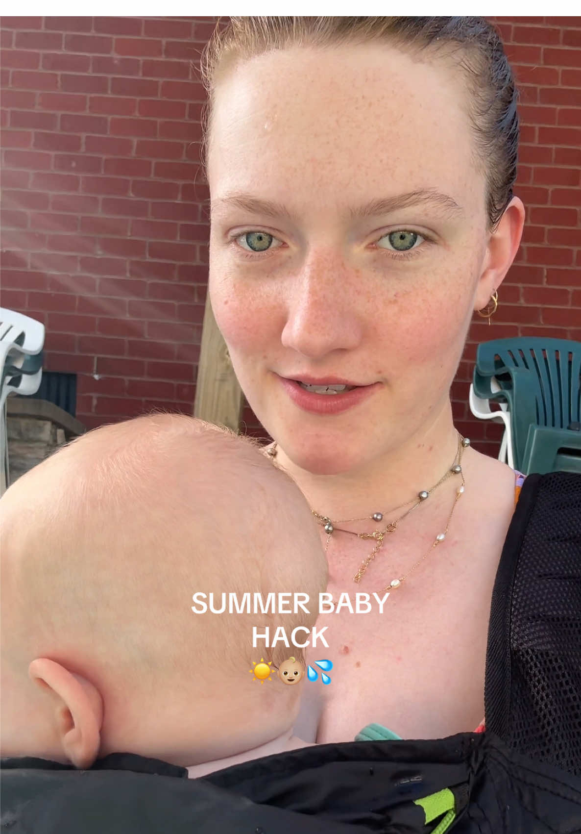 A post by @elyssajoy_ on TikTok caption: using my @boba carrier in the pool just might be genius #baby #LifeHack #mom 