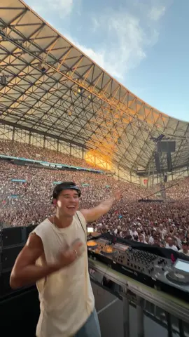 A post by @johnsummit on TikTok caption: just played to a crowd of 65k in france nbd