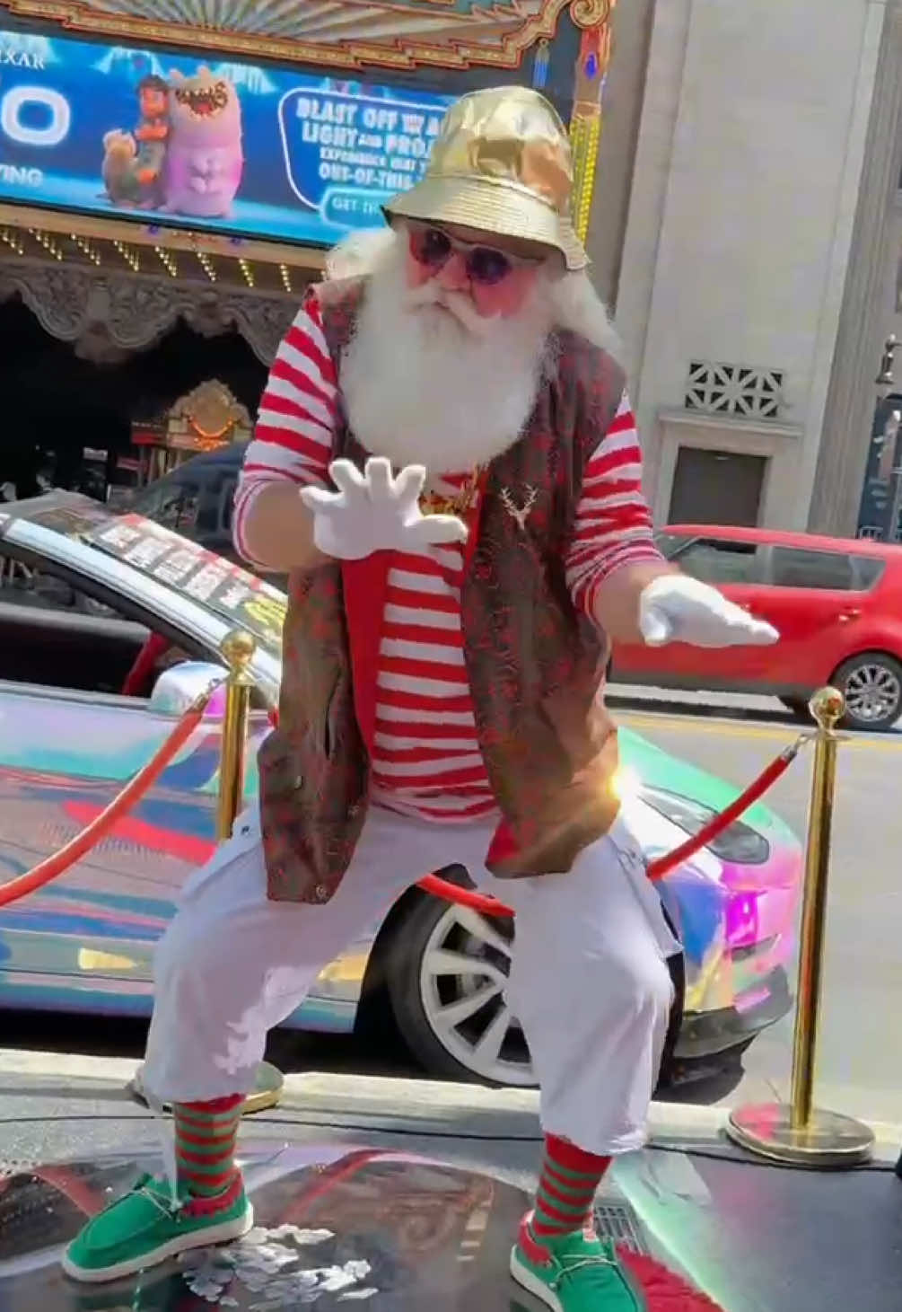A post by @santacorky on TikTok caption: Mrs. Claus said ONE night out… now he’s on TMZ. 🎅🏻   #hollywood #santa #vidcon #lasangeles 