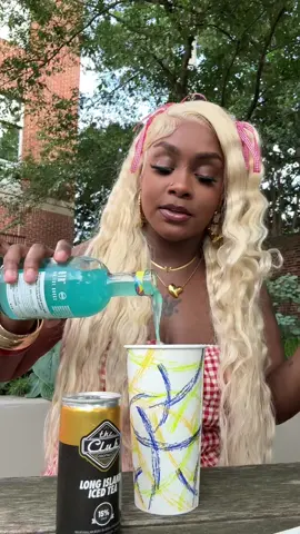 A post by @brownskinmami1 on TikTok caption: happy juneteenth weekend!!! blue hawaiian 🌺 and long island ice tea😝 #brownskinmami #trend #trending #drinkydrink 