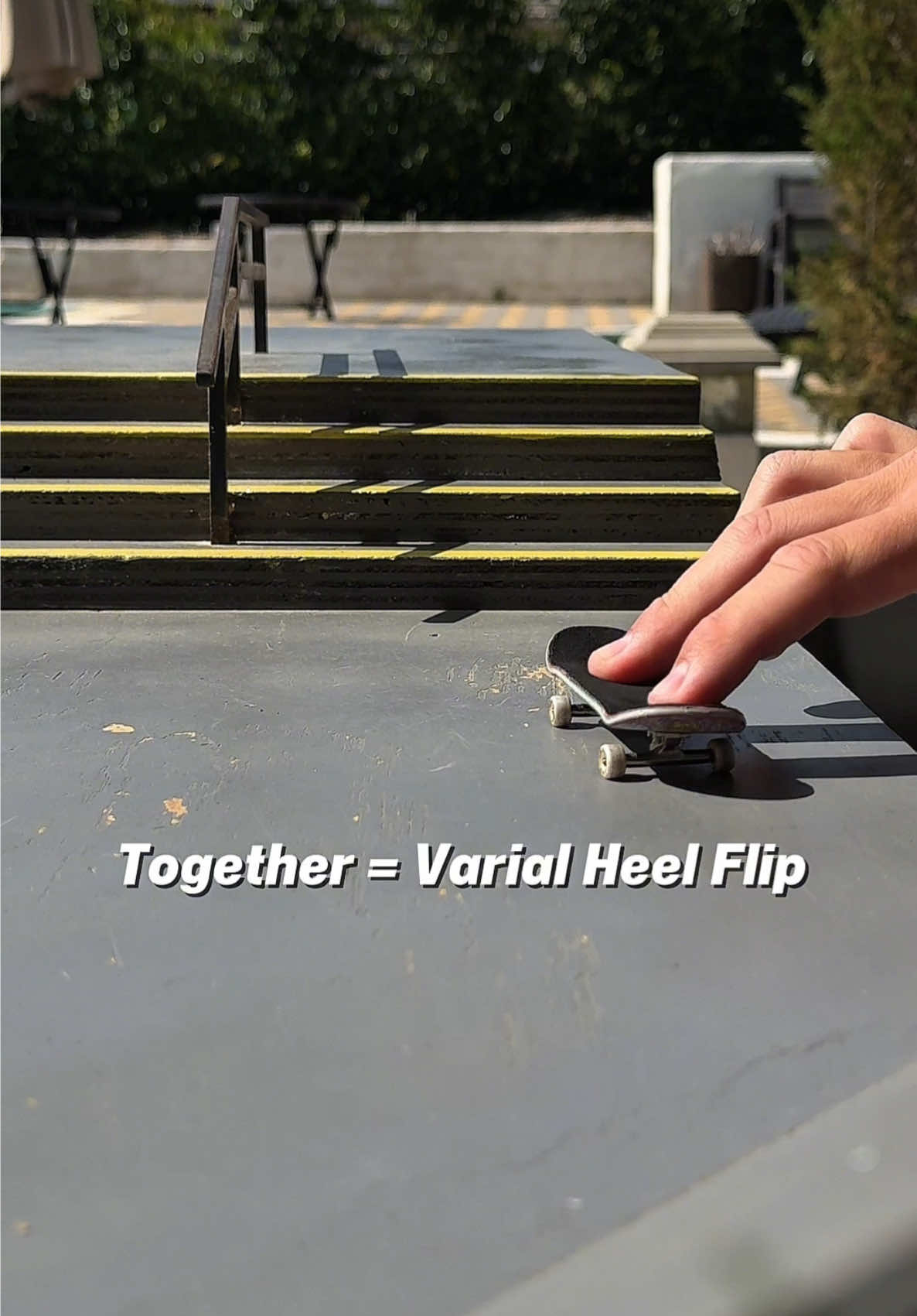 A post by @jakepfb on TikTok caption: VARIAL HEEL FLIP❕ #fingerboard #fingerboarding #howto #breakdown #Skateboarding 