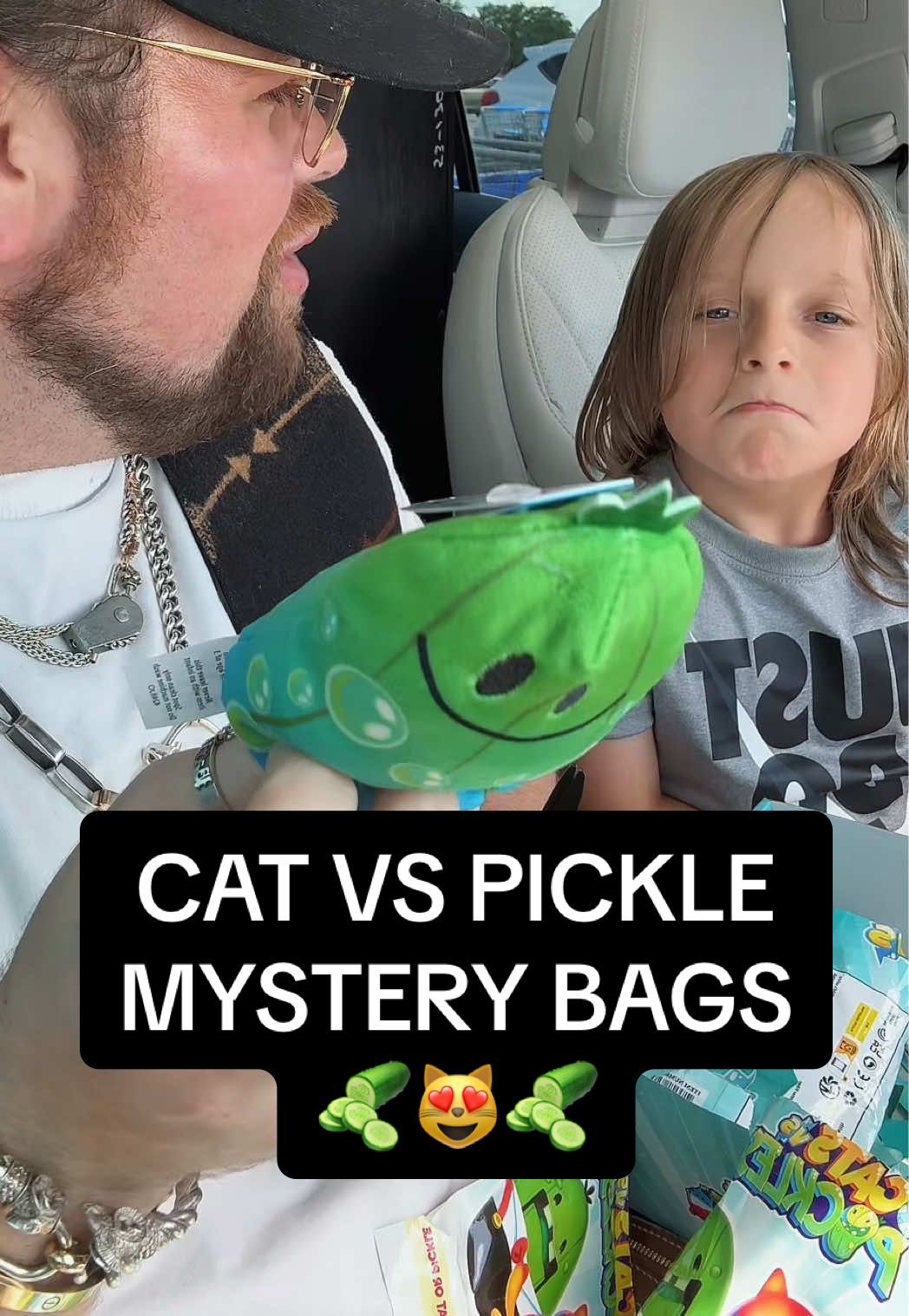 A post by @thisdadtiktoks on TikTok caption: WE ARE OBSESSED 😻🥒#catvspickles #mysterybox #mysterytoys #toys #toytok #blindbox #blindbag  #thisdadtiktoks #dailyvlog #Vlog #DayInMyLife #haul #haultok #shopping #letsgoshopping #shopwithme #fyp #dadsoftiktok #MomsofTikTok #familytime #familytok #family #catsoftiktok #cats #pickles 