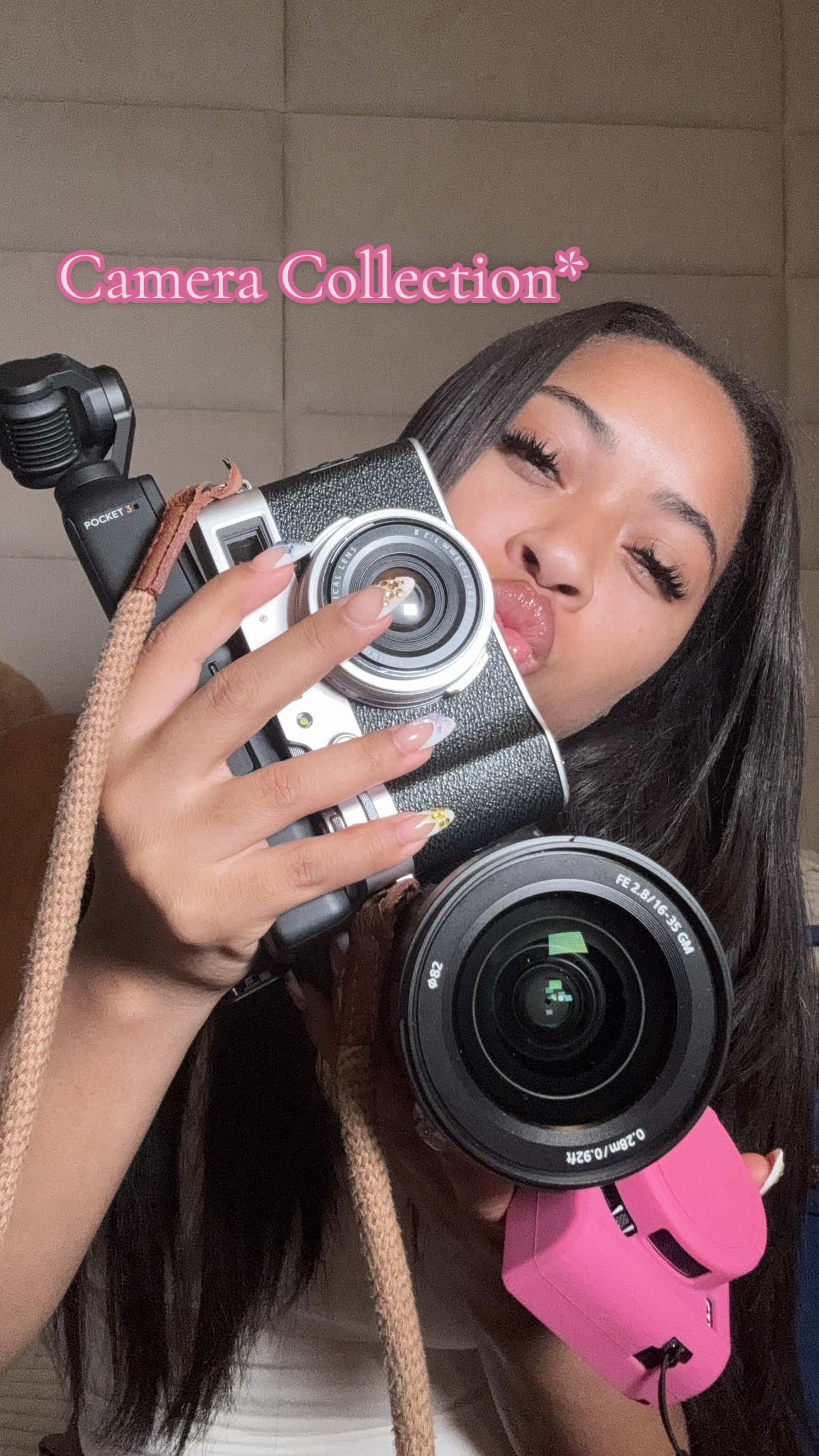 A post by @indiaroyaleb on TikTok caption: Do y’all think I’ll start uploading more? #cameracollection #canong7x #sonyzv1 #osmopocket3 