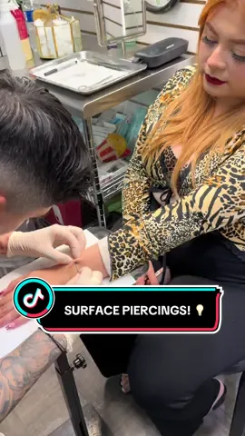 A post by @axtrig on TikTok caption: (TRIGGER ⚠️) #foryou #piercingtok 