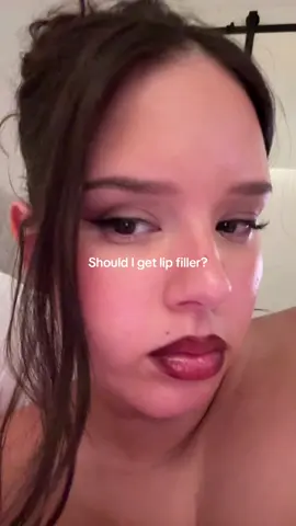 A post by @whor3chata_ on TikTok caption: Lip filler yes or no