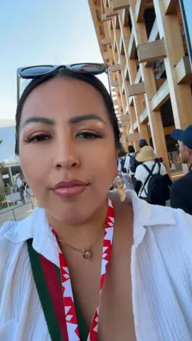 A post by @ on TikTok caption: Walking around the Osaka Expo in Japan before our performance and we got to see our chef brother Quintin Globus from Frog Lake, Alberta! He’s Cree, and it was so cool watching him on stage showing everyone how to make bannock even with the help of a translator. Only in Japan and still getting fed some real rez food! We were lucky enough to grab some bannock after his show and hang for a bit. Our humor is one-of-a-kind teasing, laughing, that good medicine. Sending Chef Quintin big good luck and good prayers and mad thanks for the food and the laughter. Wopila tanka! 🪶 #NativeTikTok #Native #IndigenousExcellence #CreeChef #BannockLove #nativehumor #lakota #IndigenousFood #OsakaExpo2025 #NativeInJapan #PowwowLife #IndigenousPride #WopilaTanka #toniajohall 