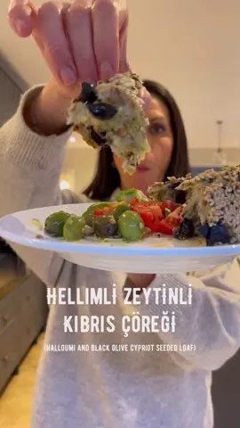 A post by @melizcooks on TikTok caption: If you’re thinking of doing some baking this weekend, then this one is for you! Since I first posted this recipe,  the remakes have blown my mind! Thank you to everyone who has made and shared this one with me - this beautiful bread is the lovechild of two of my most popular recipes - Kıbrıs Çöreği (Cypriot Seeded Loaf) and Hellimli Zeytinli Kek / Bulla (Halloumi and Black Olive Cake / Loaves). The cracked green olives on my plate are the “cakistez” I made using the olives from my mum and dad’s garden and the hellim I’m using is homemade from a little village called Ötüken, not far from Gazimağusa (Famagusta) and it’s beautiful. The full recipe is on my blog, link in bio - please make it!  RECIPE Makes 1 loaf For the dough 225 ml (8 fl oz) lukewarm water 100 ml (3½ fl oz) lukewarm milk ½ tsp caster sugar 7 g (¼ oz) fast-action dried yeast 1 tsp salt 500 g (1 lb 2 oz) strong white bread flour, plus extra for dusting (optional) 1 tsp olive oil For the filling 50 g (1¾ oz) fresh coriander leaves, finely chopped 25 g (1 oz) fresh mint leaves, finely chopped 2 spring onions, finely chopped 100 g (3½ oz) pitted dry black olives, roughly chopped 250 g (9 oz) hellim (halloumi cheese), cut into 2½-cm (1-inch) cubes 2 tbsp olive oil 1 small onion, very finely diced For brushing 1 tbsp flour 1 tsp water 1 tsp milk For coating 4 tbsp sesame seeds 1 tsp nigella seeds ¼ tsp aniseed  #melizcooks #kıbrısçöreği #hellim #halloumi #zeytin #olives #blackolives #oliveoil #sesameseeds #bread #meze #mezze