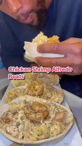 A post by @blackfoodiefinder on TikTok caption: Chicken Shrimp Alfredo Boats (via @Jarvis Teddy) #BlackFoodieFinder #chickenalfredo #shrimpalfredo #pasta 