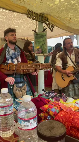 A post by @sher_leas on TikTok caption: @Rowdy Bardlings preforming in our booth at the Oregon Ren Faire! Favorite band! Such a great time #oregon #renaissance #faire #band #pogues #dancing #irishmusic #music #magic #magicmoments #titanic #thirdparty 