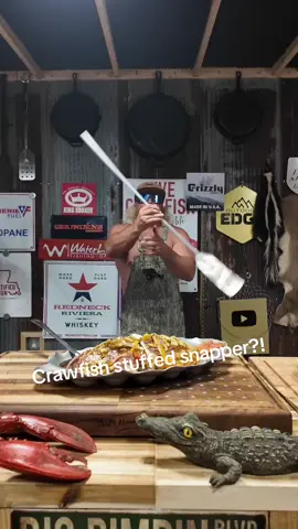 A post by @stalekracker on TikTok caption: Come along as we take this snapper straight from the Gulf of America and stuff it with a rich, buttery crawfish filling — fresh caught, fresh cooked, straight to the table. Gulf to gut, baby! ? #WaterToTable #CajunStyle #StuffedSnapper 