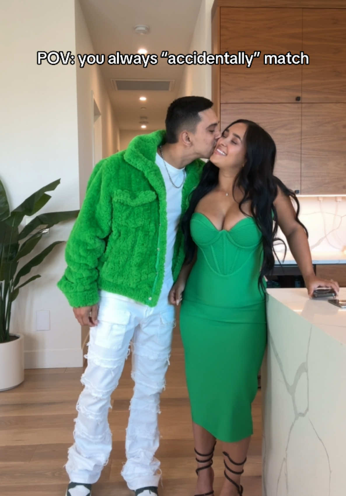 A post by @isaacandandrea9 on TikTok caption: Just a coincidence 🤷🏻‍♂️ @Fashion Nova #fyp #FashionNova #viral #couple  ❤️A Night in Paris Bubble Mini Dress ❤️High Collar Gloss Puffer Jacket 💚It’s A Lifestyle Midi Dress 💚Francis Fur Jacket 
