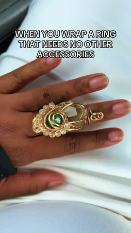 A post by @shashasvoice on TikTok caption: I am in love with this ring 😍 #ring #crystaljewlery #copperjewelry #wirewrapping #jewelry #hands 