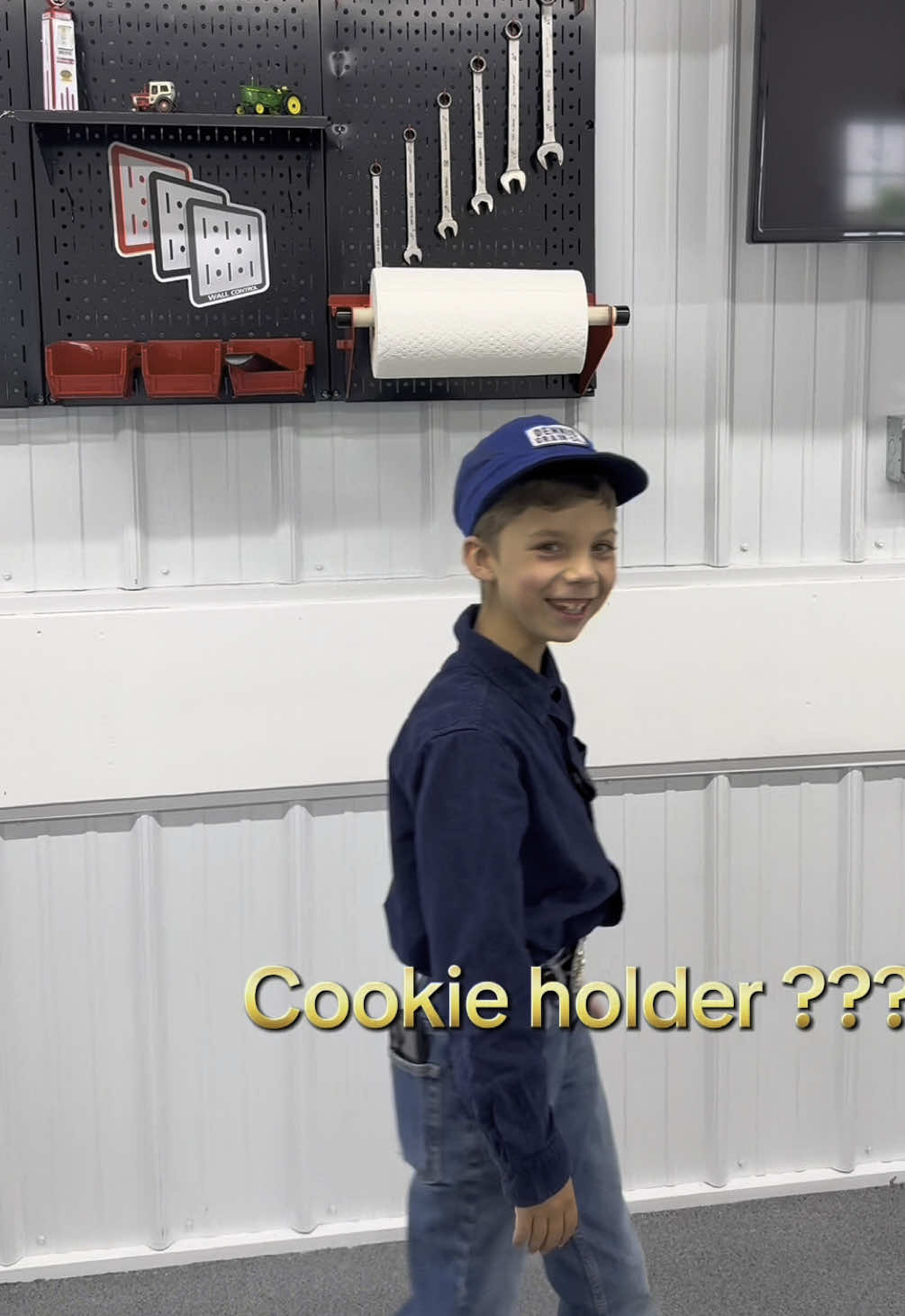 A post by @justajacksonthing on TikTok caption: Jackson and we all like things easy to find and organized. So we went with @Wall Control to help us out . Their pegboard systems are great, Jackson of course wanted it to match the #storloc toolbox in the @84 Lumber Company barn. Who knew we needed a cookie holder 😂#farm #justajacksonthing #fyp #makefarmingfun #farmlife #organization #futurefarmer 