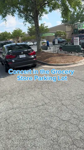 A post by @yo_thats_erica on TikTok caption: Even if he isnt really playing , he’s still putting on a show 🤷🏽‍♀️ His Sign Said he was Playing for Rent, Food & Diapers.  We enjoyed the music ❤️ #thatmanandthemkids