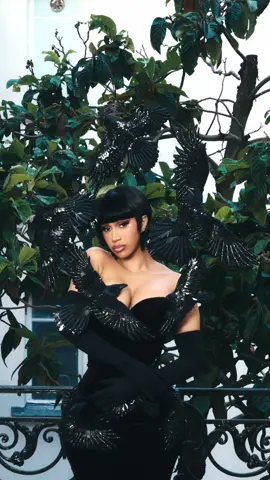 A post by @iamcardib on TikTok caption: TIMES UP. 🪶 I got an announcement to make tomorrow 