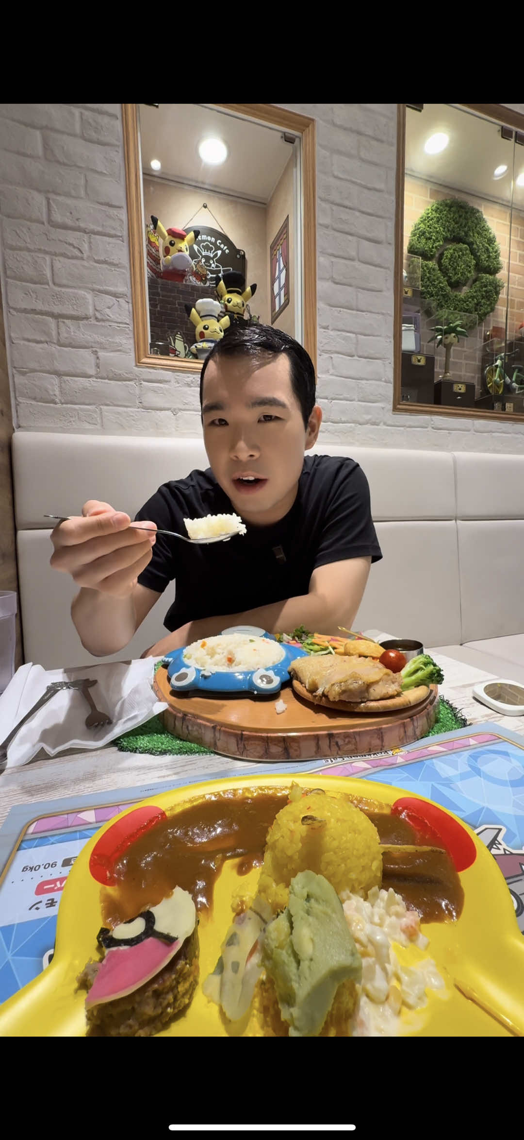 A post by @asianchowdown on TikTok caption: EATING AT THE POKEMON RESTAURANT IN JAPAN #food #Foodie #foodreview #pokemon #japan #mukbang 
