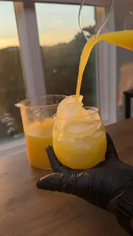 A post by @chefchosen on TikTok caption: Grew up on juice like this—homemade, fresh, and you only got one cup, so you made it count. Pineapple, ginger, lemon… for the ones making memories at home this summer.