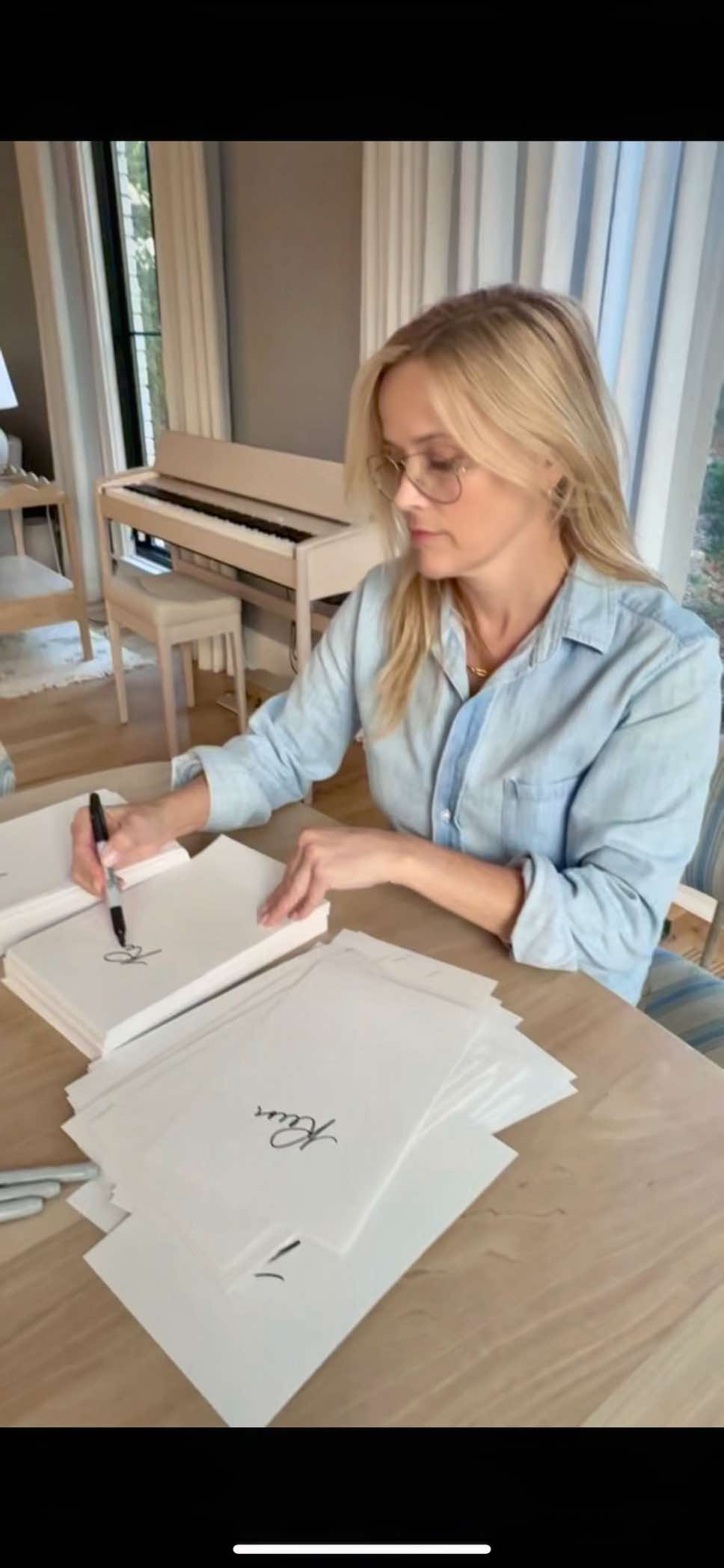 A post by @reesewitherspoon on TikTok caption: Pack your bags (and your bookmarks!) We’re hitting the road for the GONE BEFORE GOODBYE book tour! 📚✈️ Tickets go on sale Friday at 10am ET for Los Angeles, New York, St. Louis, Charleston, and Nashville – and save the date for London!