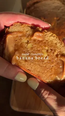 A post by @mrsmckennabarry on TikTok caption: Let’s bake some Maple Cinnamon Banana Bread 🍞🍌 Recipe: @mersgoodeats  INGREDIENTS • 3 ripe bananas • 1/2 cup melted unsalted butter • 1/2 cup maple syrup • 1/2 cup plain greek yogurt • 2 eggs • 1 tsp vanilla extract • 1 1/2 cups all purpose flour • 1 tsp baking powder • 1/2 tsp baking soda • 1 tsp cinnamon DIRECTIONS • Start by preheating your oven to 350°F • Using a stand mixer *or by hand* mash your bananas until smooth. • Add in your melted butter and maple syrup and mix until combined. • Add in your eggs, vanilla and greek yogurt and mix again. • Remove your bowl from your stand mixer and add in your dry ingredients. • Fold until all dry bits are incorporated. • Add to a lined loaf tin and bake on 350°F for 55-60 minutes #bananabread #bananabreadrecipe #healthybananabread #cozybaking #bakewithme #cottagecorebaking #cottagecore #cottagecoreaesthetic #cottagecorekitchen #cozy #cozytok #food #foodie #fyp #foryou #foryoupage #healthyrecipes #healthydessert 