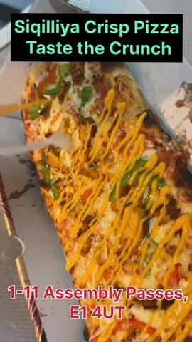 A post by @runnertvuk on TikTok caption: Get Siqilliya Crisp Pizza Delivered Hot & Crispy – Order Now! 1-11 Assembly passes, E1 4UT 