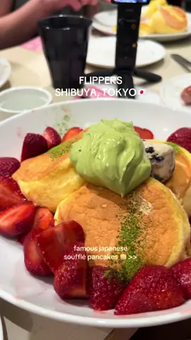 A post by @misscuddy on TikTok caption: Part 4 | they had the nerve to have a matcha topping!! still thinking of this meal😩 #flippers #flippershibuya #japanesepancake #souffle #soufflepancake #flipperstokyo #tokyo #tokyoeats #japan #tokyopancakes #travel 