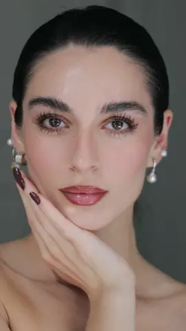 A post by @minazibayi on TikTok caption: Brown tones 🤎 #makeup 