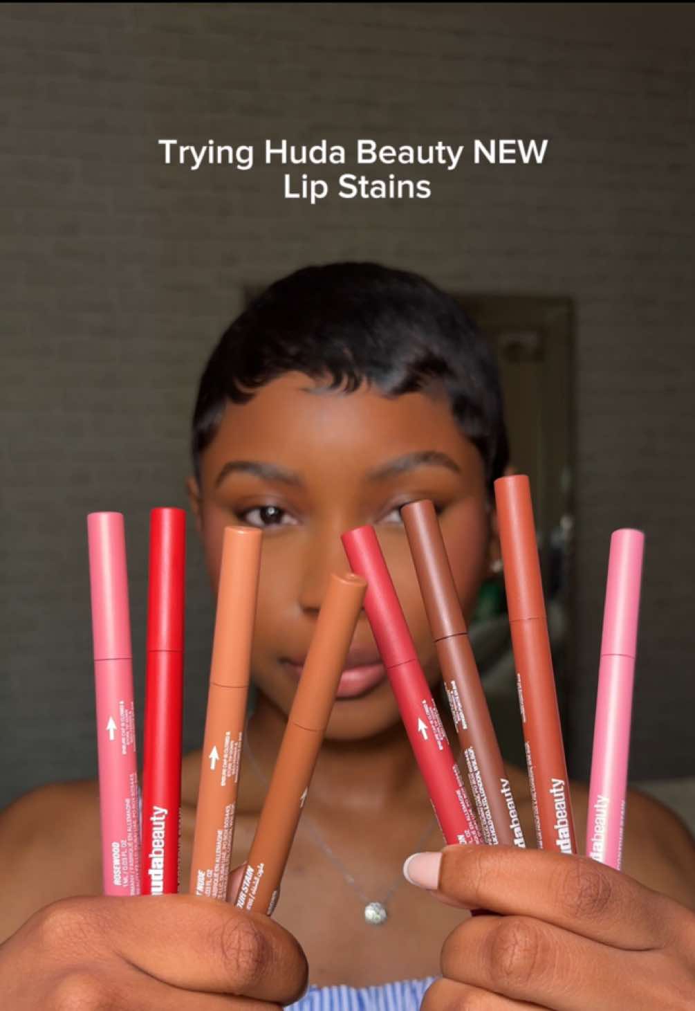 A post by @jasorjas on TikTok caption: Trying @Huda Beauty NEW Lip stains! 💄💋 Lip gloss- @thelipbar  #Makeup #lipstain #hudabeautylipcontour #hudabeauty #makeupreview #newmakeup #lipcombo #brownlipcombo #nudelip #makeupforblackwomen #wocmakeup 