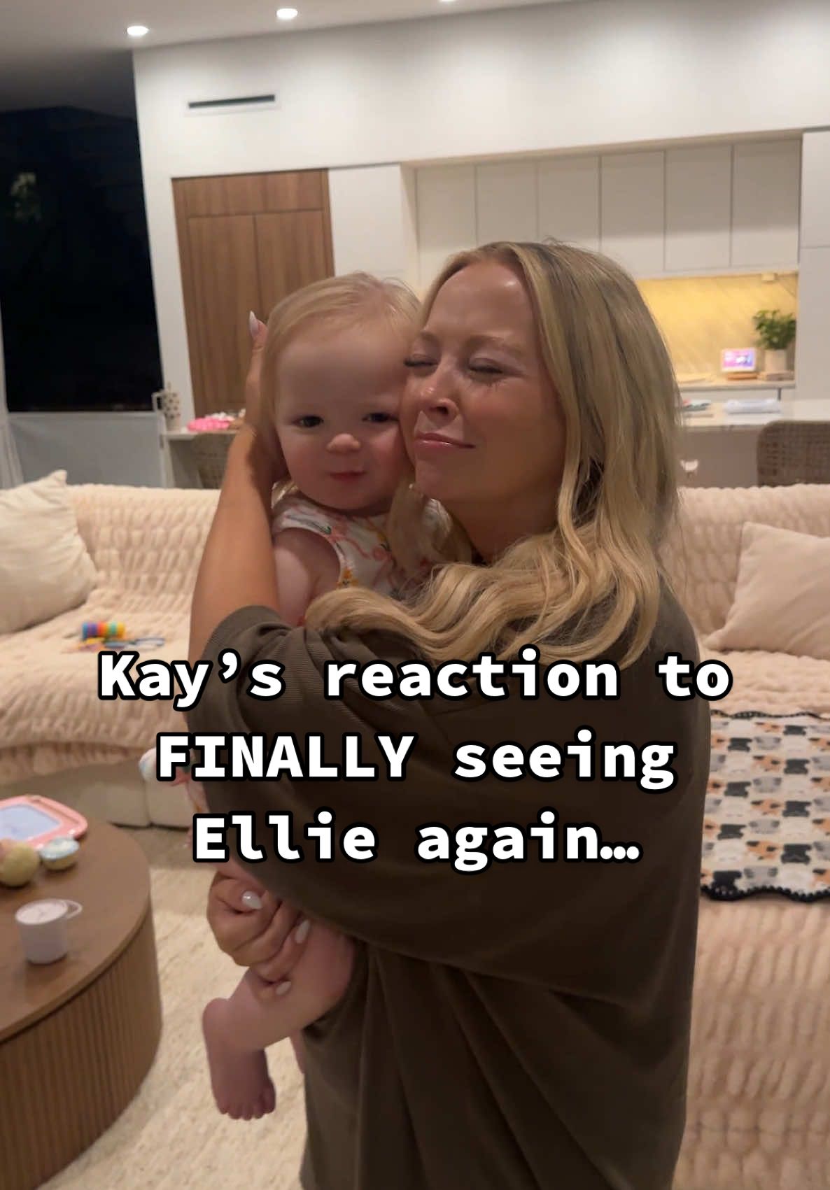 A post by @kayandtayofficial on TikTok caption: Ellie was so cute when she got the zoomies! 😂🥹 backstory ::: we had to leave for a few days for work, and my parents watched Ellie while we were gone. We were missing her so much, and were so excited to see her! Our flight kept getting delayed, and we finally got home late, but luckily Ellie was still up to meet us! At first she was so quiet, but then she got the zoomies! 😂 it’s so nice to finally be home with Ellie again, and get back to our routine with her! 🩷 #kayandtayofficial #couples #relationships #pregnant #postpartum 