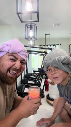 A post by @logandurrance12 on TikTok caption: 2 Durrances in a hair towel??? 😂😂 let’s get this house cleaned up baby!! #dadsoftiktok #momsoftiktok #CleanTok 