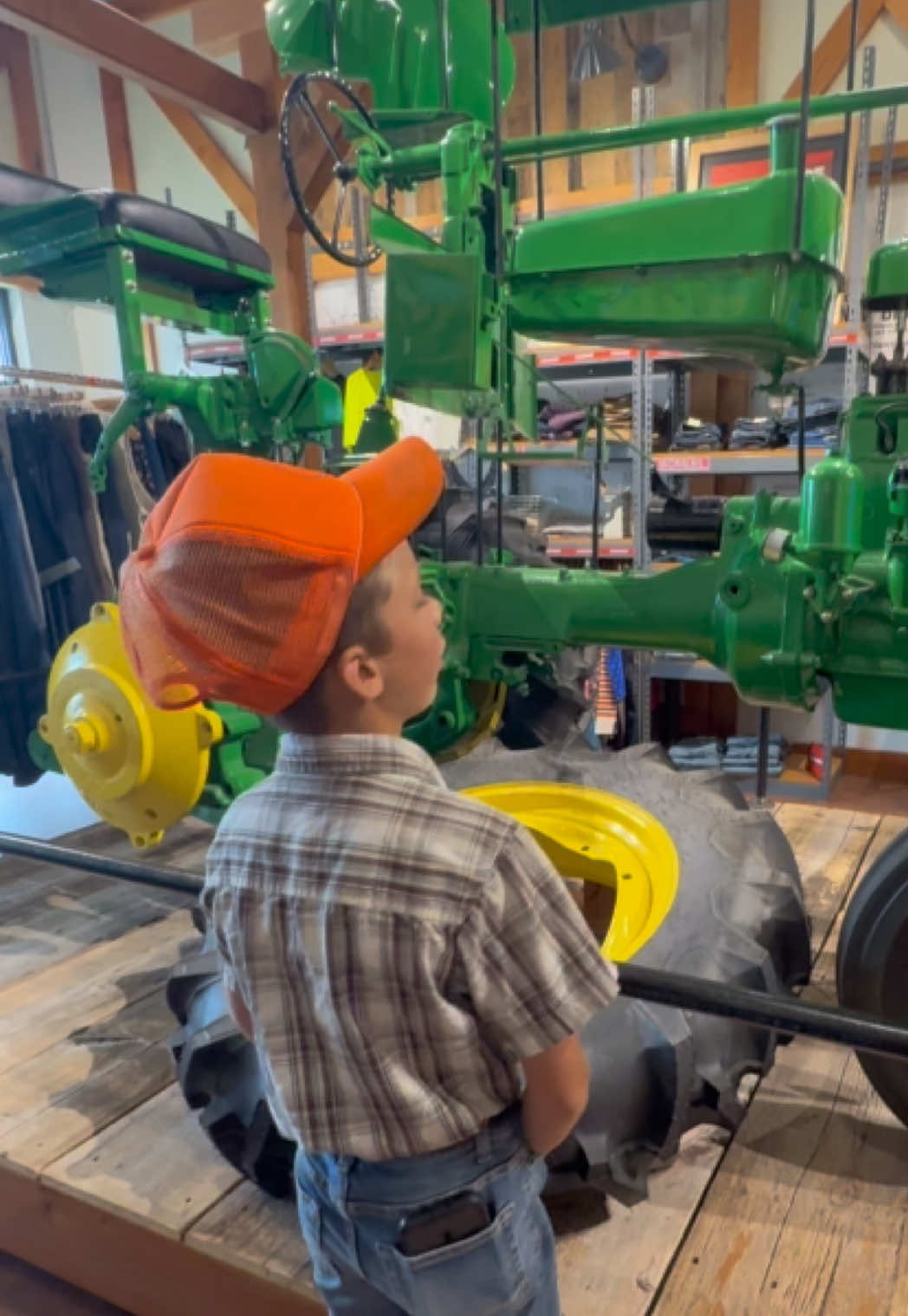 A post by @justajacksonthing on TikTok caption: When @Mr Propane wants to stop at @Duluth Trading Company it’s very handy that they usually have a tractor in one of their stores. This one happens to be in Iowa #fa#farma#farmtokr#tractorkida#makefarmingfunu#justajacksonthingl#oldschoolo#JohnDeereo#roadtrip