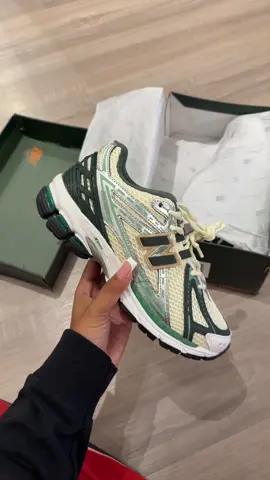 A post by @usernamelotus on TikTok caption: New Balance 1906R but from the yellow app. 🤭