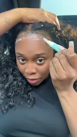 A post by @sarabeliving on TikTok caption: Portable lace glue pen for the win #believeinhair 
