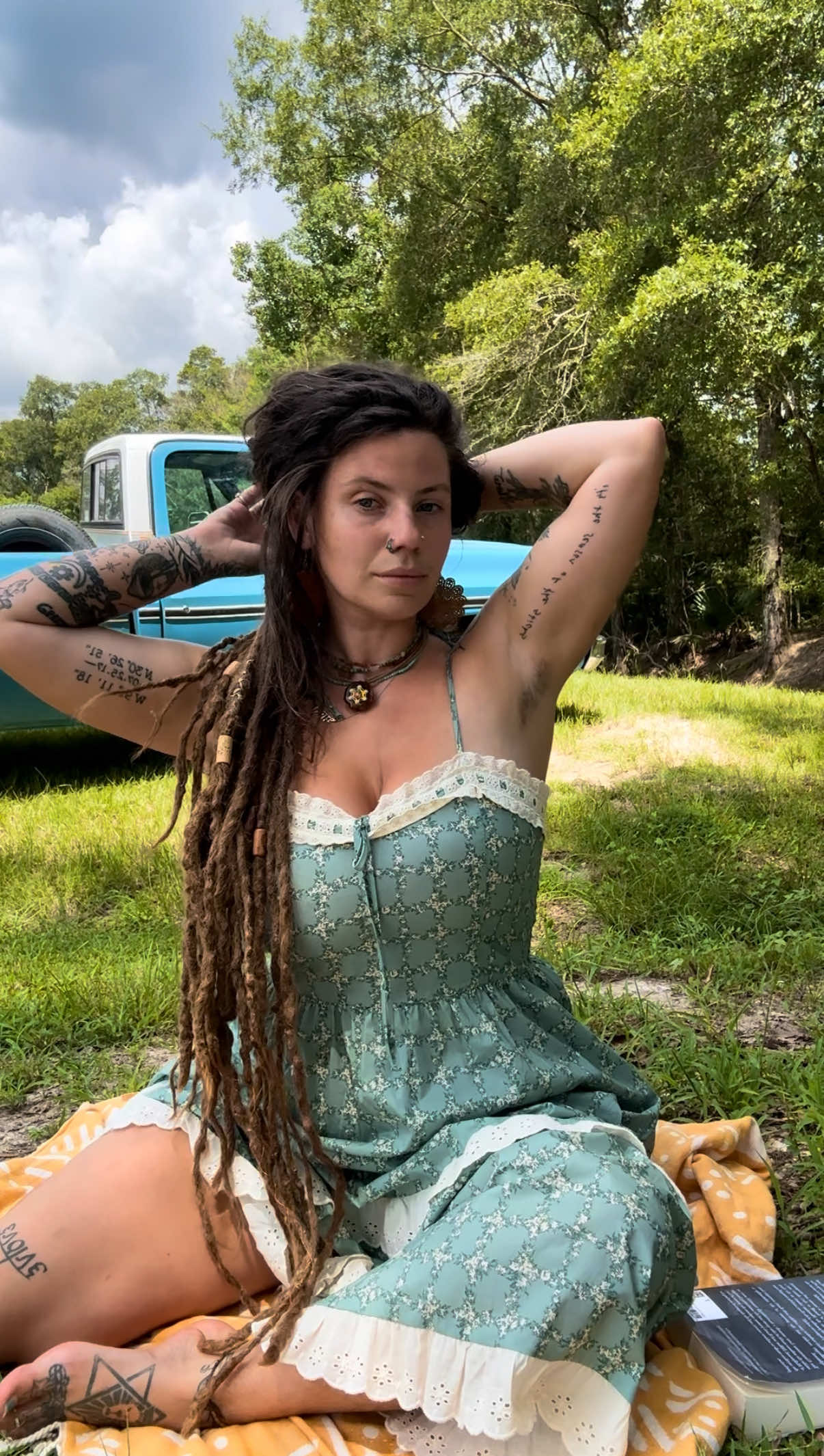 A post by @indiflwrx on TikTok caption: south louisiana summers 🌻✨#farmlife #hippie 