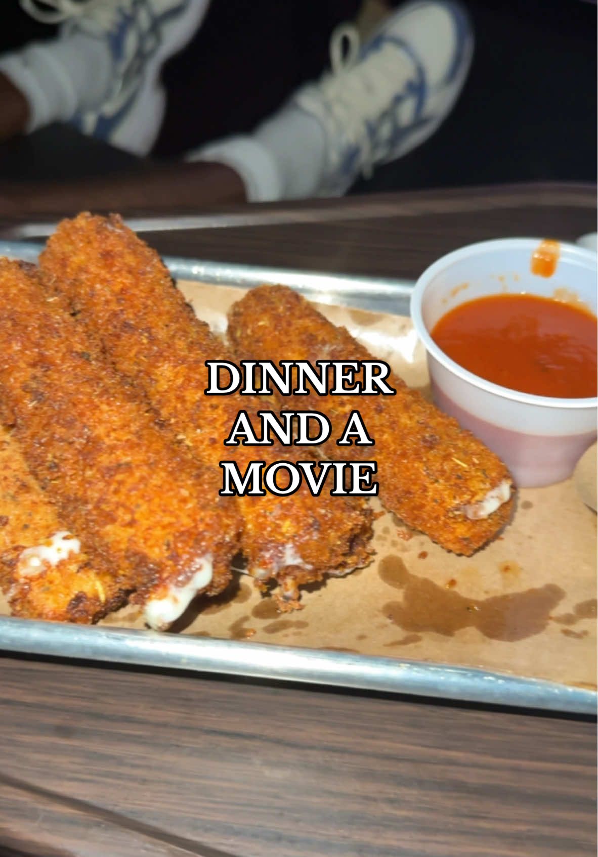 A post by @summerreignhenning on TikTok caption: Dinner and a movie at LOOK Dine-In Cinemas 🎥🍿