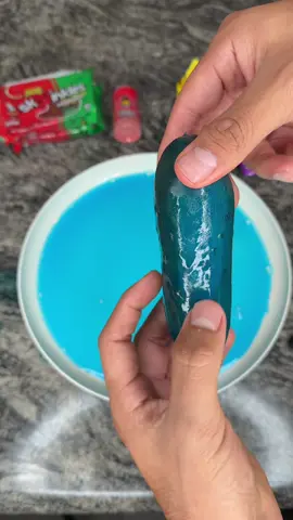 A post by @bussinsnacks on TikTok caption: Replying to @roze.buddzz That’s How you Prepare the Blue Raspberry Pickle Kit 🫡 #BussinSnacks #PickleTok #WeirdFood #SnackTok #FYP #FoodHacks #BlueRaspberry 
