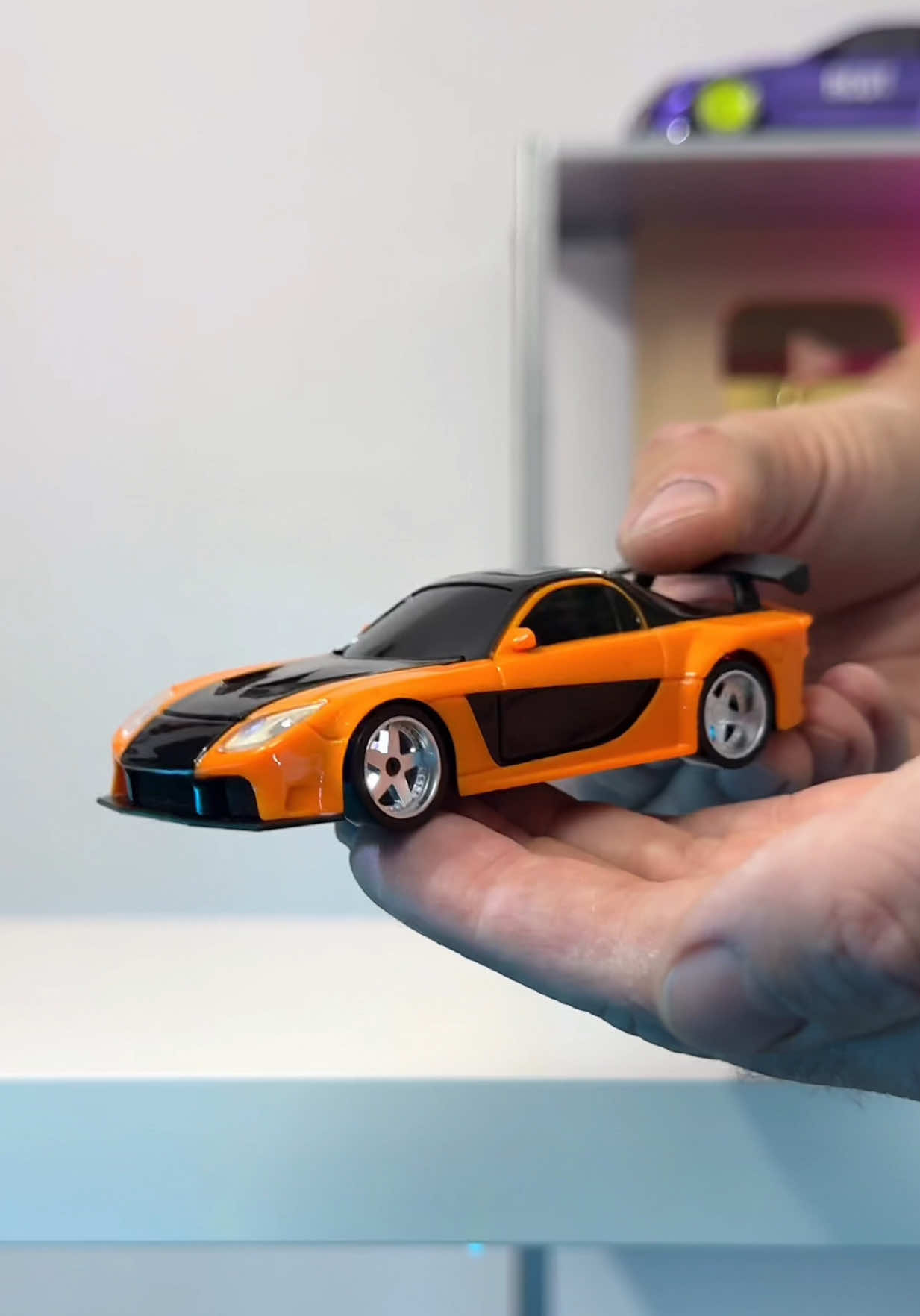 A post by @rcdrifttok on TikTok caption: Tokyo Drift RX7 RC 🤯