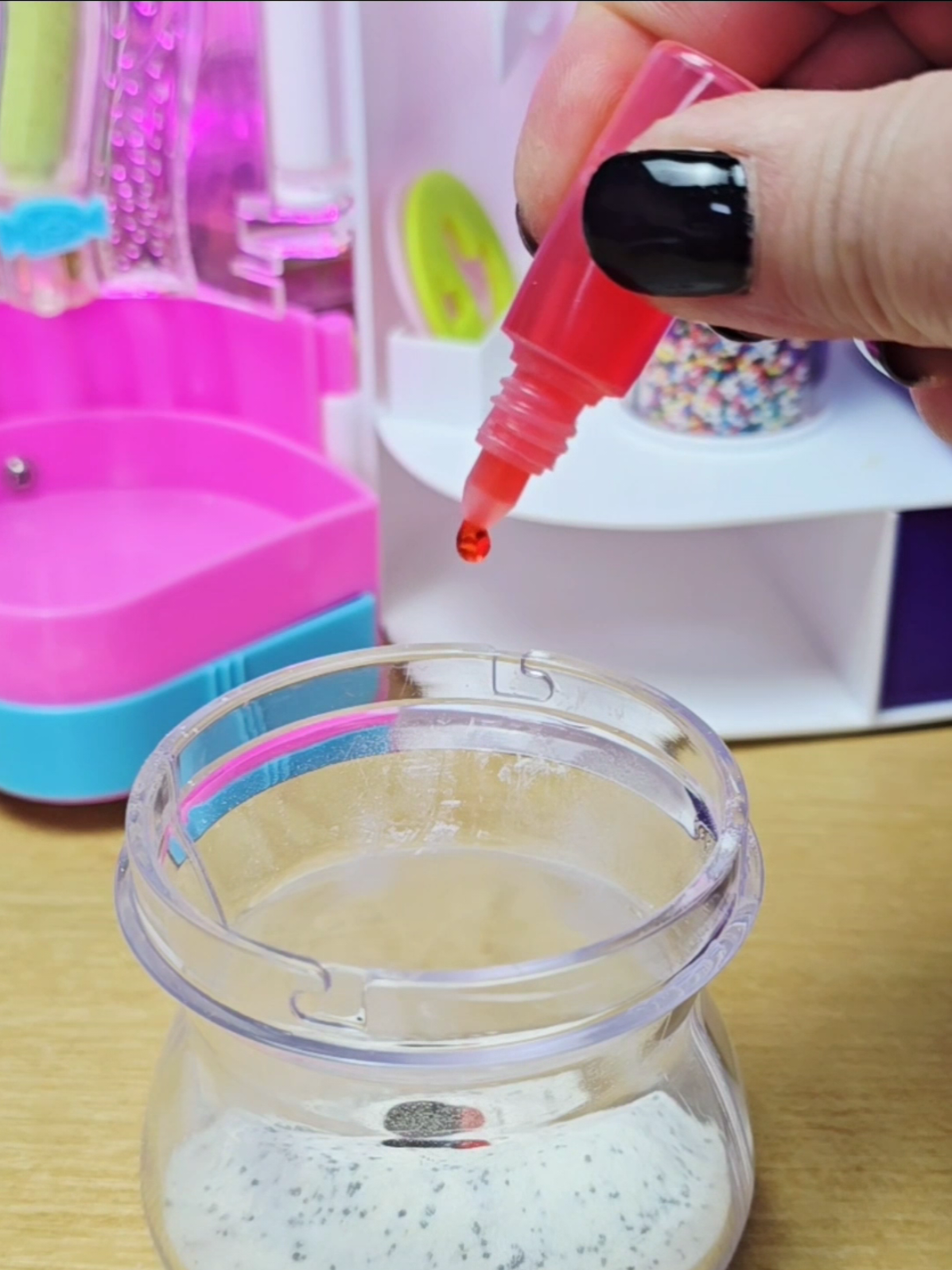 A post by @asmrplayroom on TikTok caption: Making candy snacks in my Barbie Sweet Treats Center from 2002 #asmr #barbie #nostalgia 