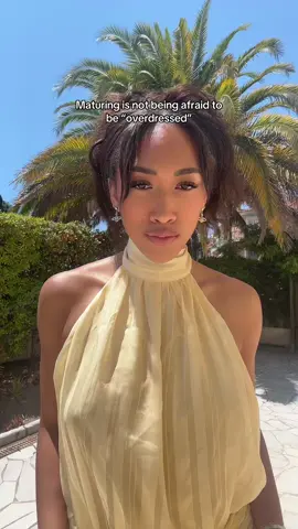 A post by @mariahcrose on TikTok caption: Make TRYING cool again #beachvibes #yellowdress #blackgirlfashion #inspo #summeroutfit 
