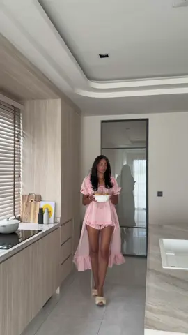 A post by @endlessmomdiary on TikTok caption: dressing up and cooking at home is my therapy 👩🏽‍🍳🎀  #easyrecipe #homecooking #fypシ #asmr #dinner #toddlersoftiktok #momlife #momtok #twinmom #aesthetic #statisfying #vlog #momvlog #selfcare #neutralhome #pinkaesthetic 