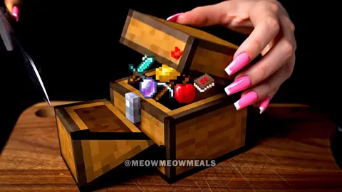 A post by @meowmeowmeals on TikTok caption: Cutting Minecraft Blocks ASMR 1 #asmr #aiasmr #asmrsounds #asmrai #satisfying #relaxing #oddlysatisfying #minecraft #minecraftasmr #veo3