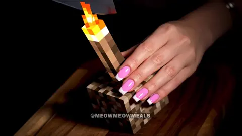 A post by @meowmeowmeals on TikTok caption: Cutting Minecraft Blocks ASMR 3 #asmr #aiasmr #asmrsounds #asmrai #satisfying #relaxing #oddlysatisfying #minecraft #minecraftasmr #veo3