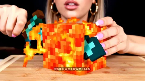 A post by @meowmeowmeals on TikTok caption: Cutting Minecraft Blocks ASMR 4 #asmr #aiasmr #asmrsounds #asmrai #satisfying #relaxing #oddlysatisfying #minecraft #minecraftasmr #veo3