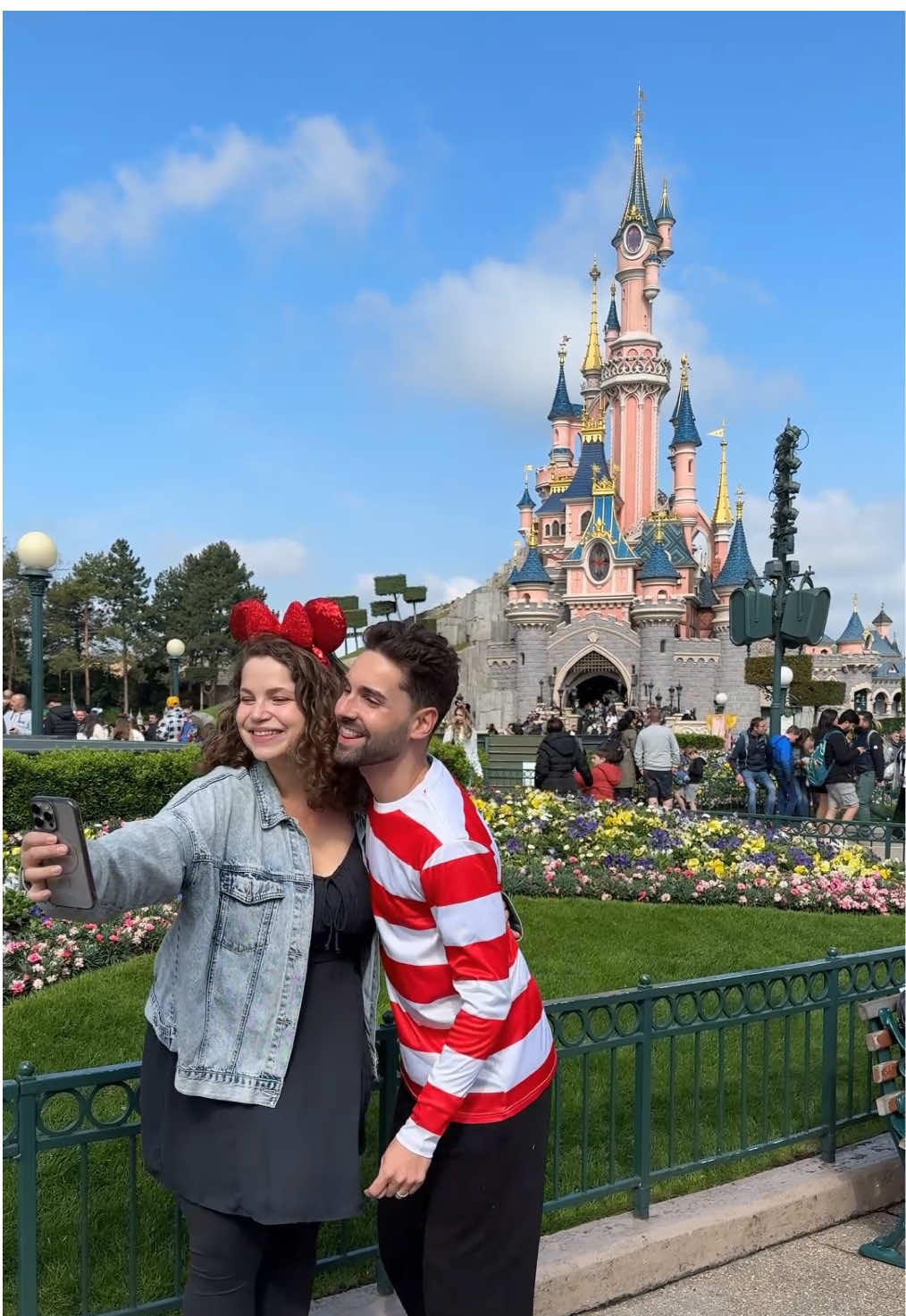 A post by @bookingcom on TikTok caption: Mind you, I came for the view at the Renaissance Paris Arc de Triomphe but stayed for easy Disneyland Paris access
