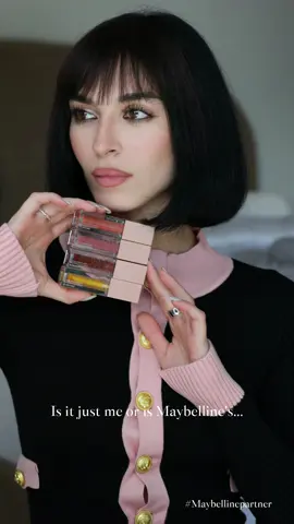A post by @minazibayi on TikTok caption: Can we all just agree that @Maybelline NY loss is that girl? 💋✨ Swatching all my fave shades so you know which ones to grab!  #Maybellinepartner #LifterGloss #DrugstoreBeauty