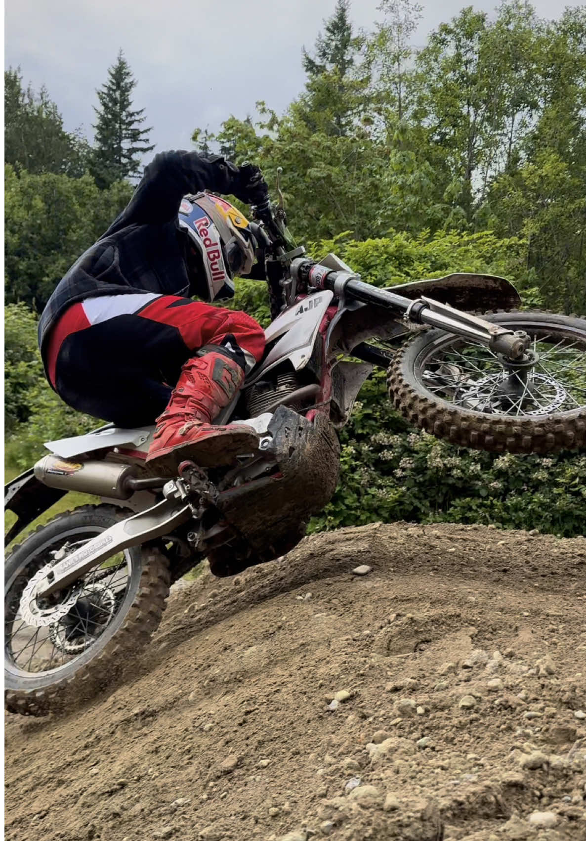 A post by @carsonbrown_910 on TikTok caption: @lordlugnutz said I could borrow his 2014 AJP PR4 240 for a beat down. Carburetor might be a bit dirty 😂 What do you guys think AJP stands for? @Red Bull Motorsports @Red Bull @MotoSport.com @All Balls Racing #AJP240